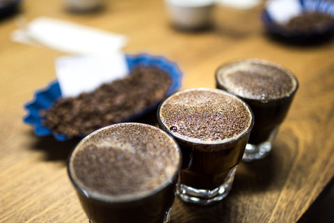 Coffee connoisseur attends coffee cupping