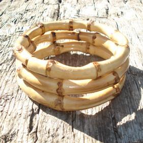 Overview of Kitsch Tiki Bamboo Bangles natural and scorched round
