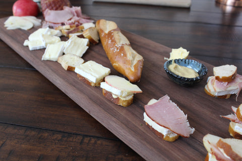 tea sandwiches made with brie cheese and sweetheart ham