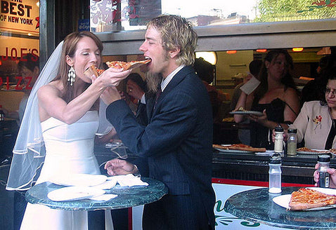 Bride and Groom Pizza Slices on their Wedding Day