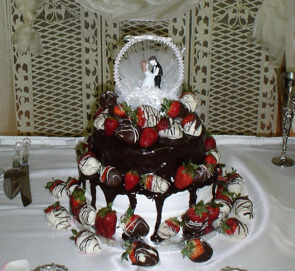 Wedding Cake Smothered in Dark and White Chocolate Dipped Strawberries