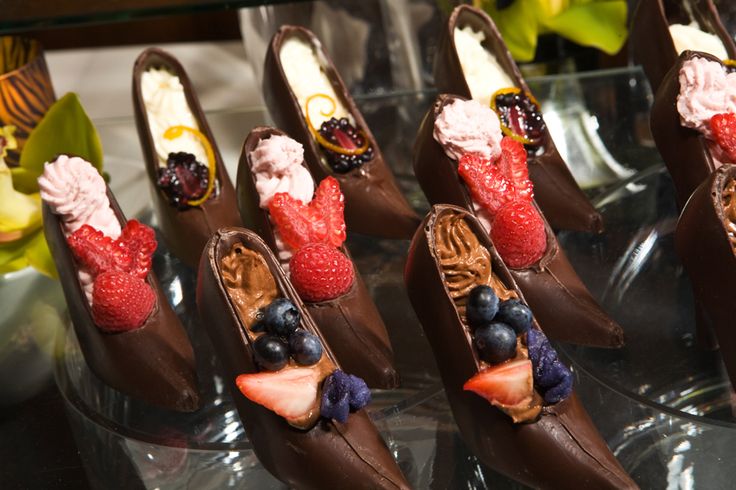 Chocolate High Heels filled with mousse and fresh berries.