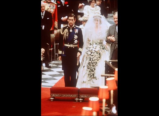 Princess Diana and Prince Charles walk dow Wedding Aisle