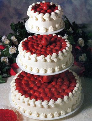 3 Tier Cheesecake Wedding Cake with Fresh Strawberries on Top and Whipped Cream