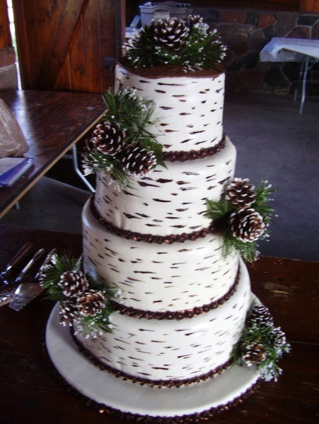 Pine tree, pine bark style winter wedding cake design.