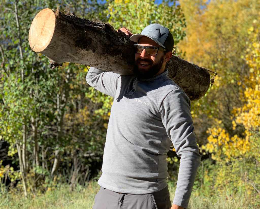Carrying wood in the Voormi men's high country henley