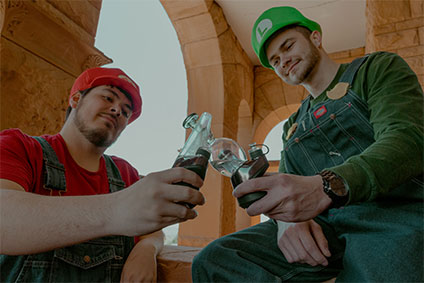 Mario and Luigi share a Puffco Peak