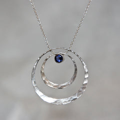 Polished sterling silver electron pendant