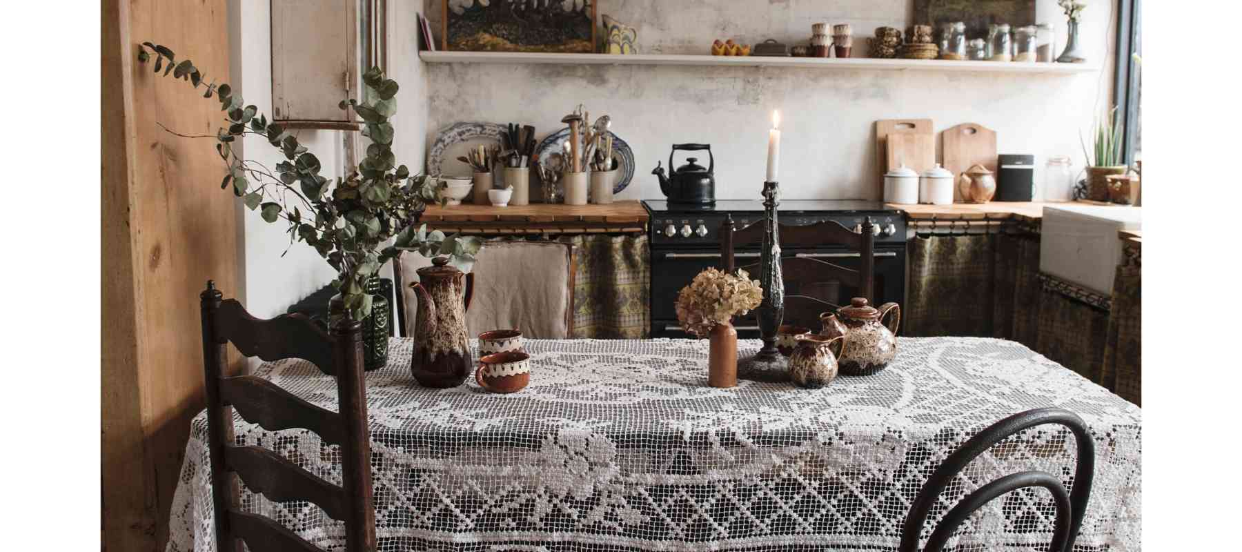 Wooden kitchen table with lace tablecloth