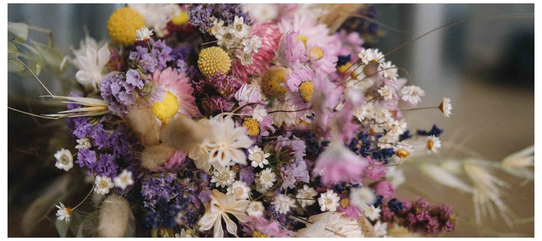 Bunch of pink and purple fresh and dried flowers 