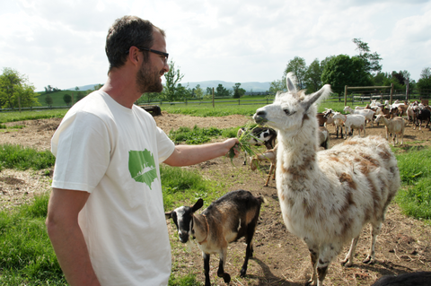 Josh with a llama and goat. 