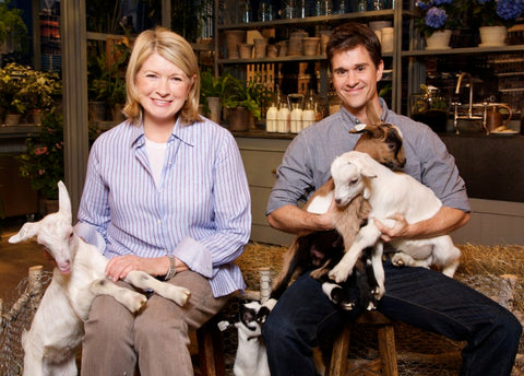 Martha Stewart and Brent Ridge with goats. 