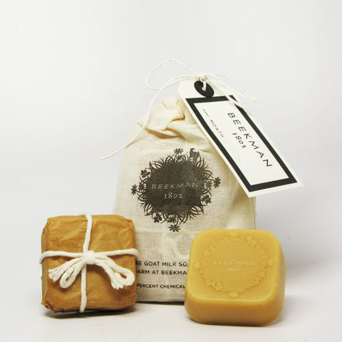 A unwrapped, wrapped and bag of bar soaps.