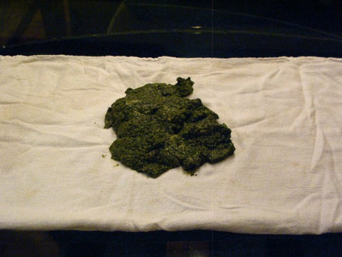 Paste of blended comfrey and flour on top of a dish towel.