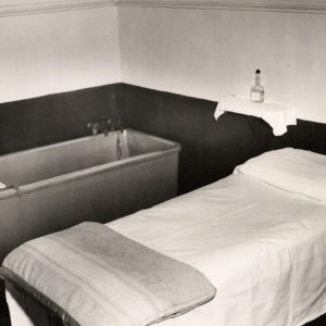 A massage table and spa bath.