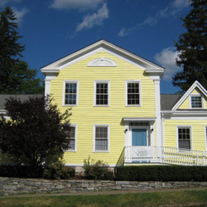 A yellow house is used as a spa in modern day Sharon Springs.