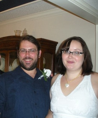 Jeanne and AJ's first wedding photo.  They had 2 weddings just to be sure!