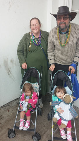 Sue and Stephen Walker with their granddaughters Betty and Daisy at a Mardi Gras Parade in Mobile, AL
