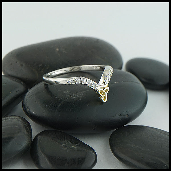 Trinity Chevron stacking band set with ten 1.5mm diamonds with an 18K yellow gold trinity knot.
