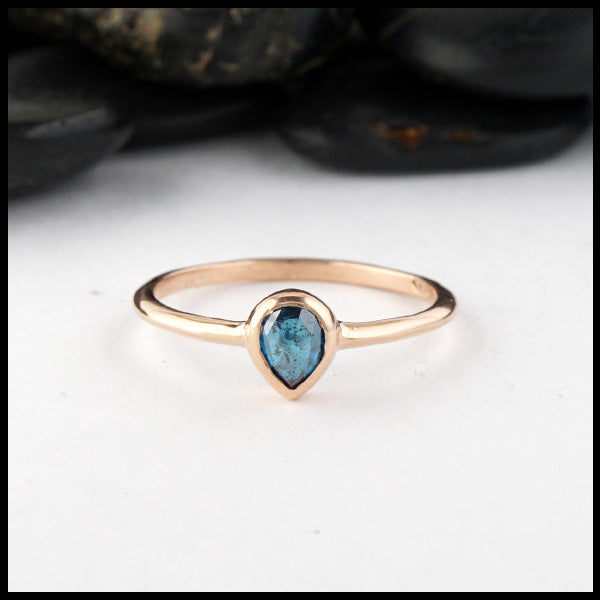 Simple 14K Rose Gold ring bezel set with 0.39ct Rose Cut Blue Diamond.