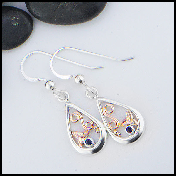 Custom Sterling Silver tear drop earrings with 14K Rose Gold trinity knots and accents, set with a 2mm Sapphire. 