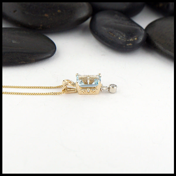 Aqua and diamond pendant in yellow gold