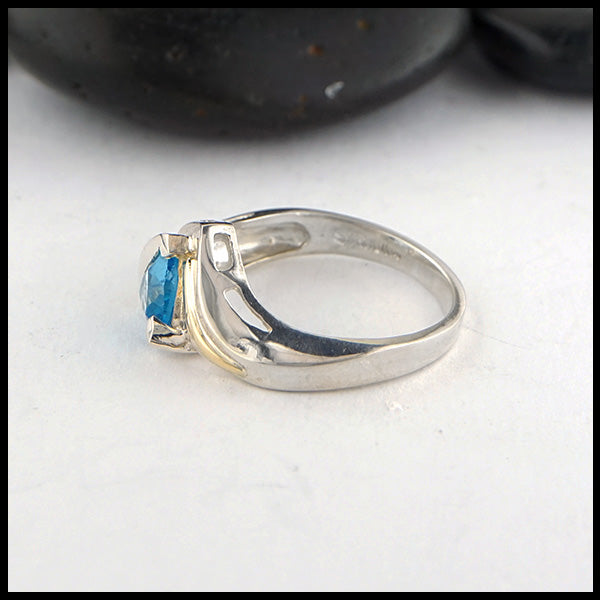 Profile view of Blue Topaz Gold and Silver Ring