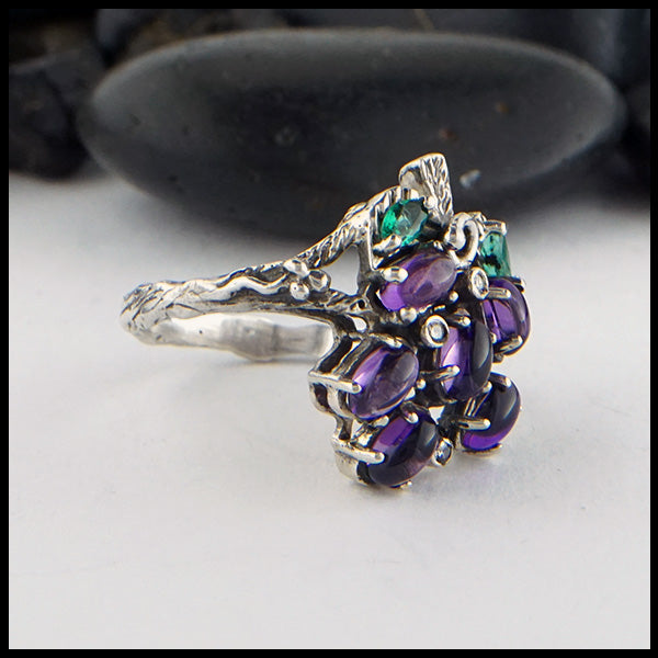 Custom Grape ring in Sterling Silver, set with oval Amethyst Cabochons, Marquise Emeralds, and diamonds. 