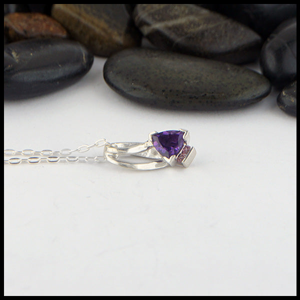 profile view of amethyst and garnet pendant