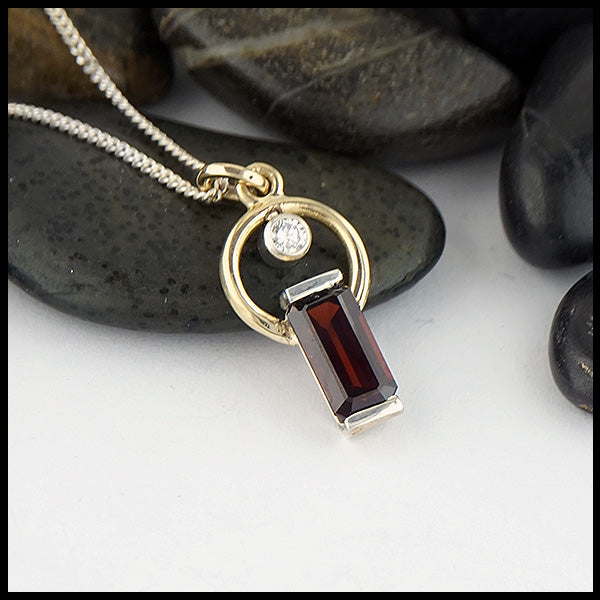 Garnet and Diamond Pendant in silver and gold