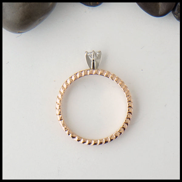 Profile view of Josephine's Knot ring in 14K Rose Gold with Reclaimed Diamond