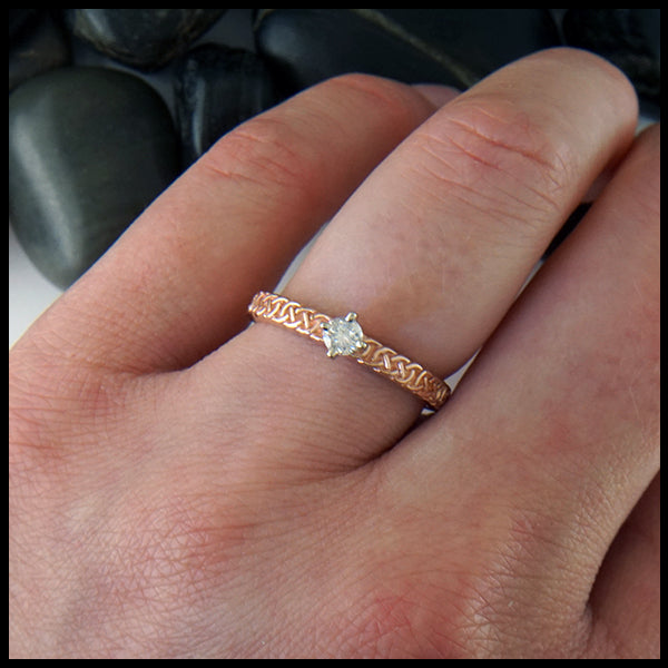 Josephine's Knot ring in 14K Rose Gold with Reclaimed Diamond shown on model's hand