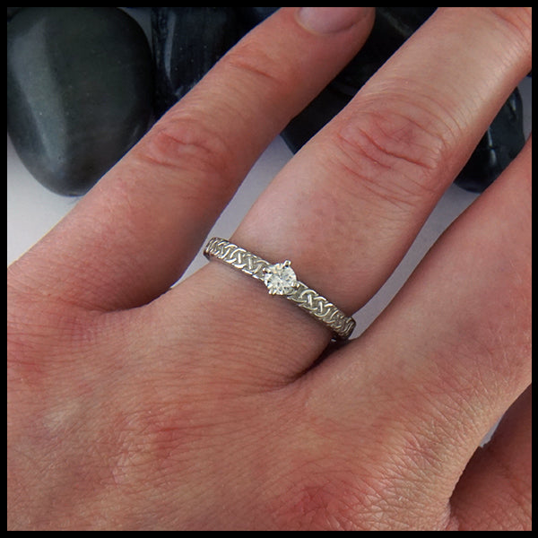 Josephine's Knot ring in 14K White gold with reclaimed diamond shown on model's hand