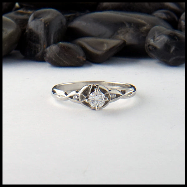 Trinity knot ring with reclaimed diamond