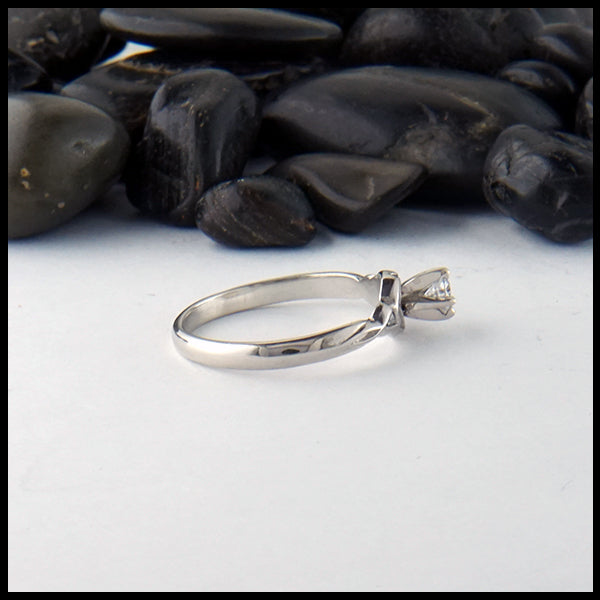 Trinity knot ring with reclaimed diamond
