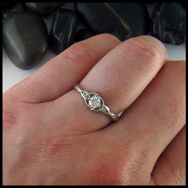 Trinity knot ring with reclaimed diamond