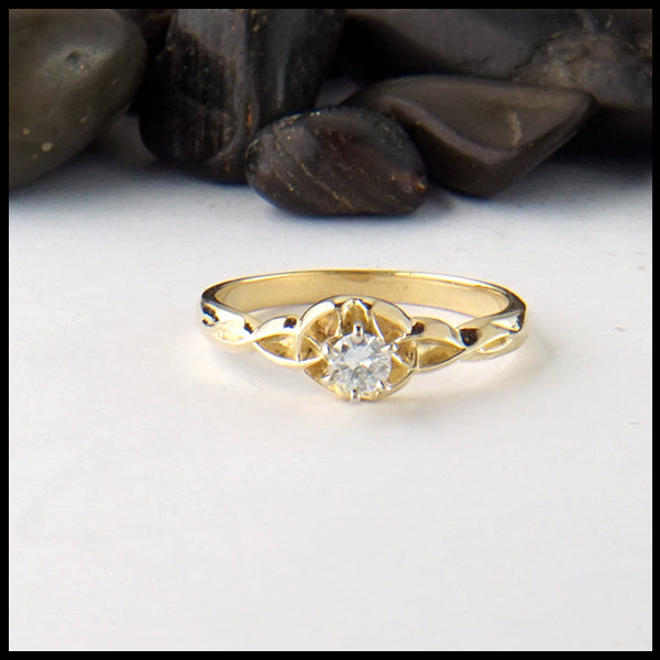 Trinity knot ring with reclaimed diamond