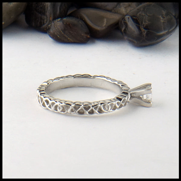 Profile view of Heart Knot ring in 14KW with Reclaimed Diamond