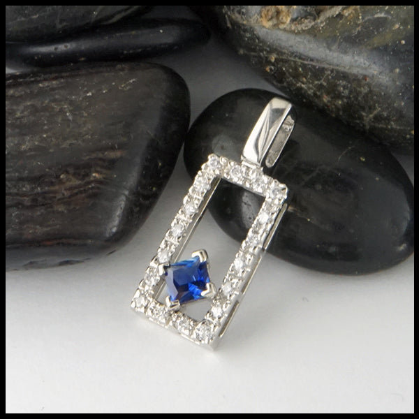 Diamond and sapphire pendant in 14K White gold