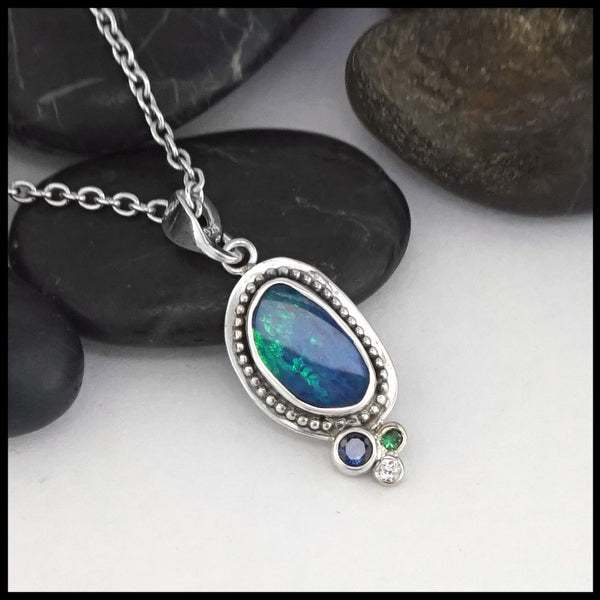 opal doublet, tsavorite, diamond and sapphire pendant 
