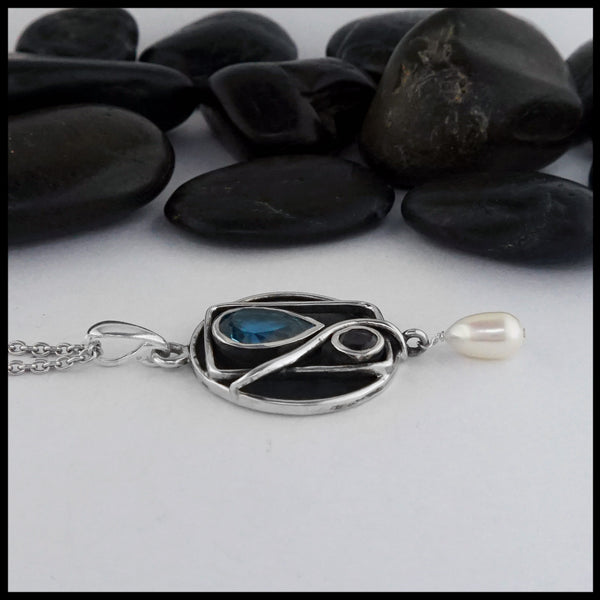 silver pendant with blue topaz, iolite and pearl 