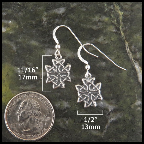 Earrings measure 11/16" by 1/2"