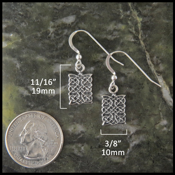 Earrings measure 11/16" by 3/8"