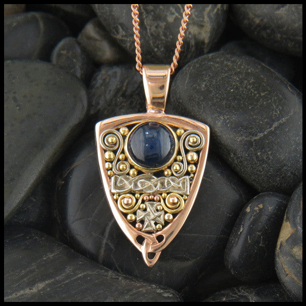 Gold Celtic pendant with Sapphire