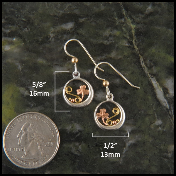 Earrings measure 5/8" by 1/2"