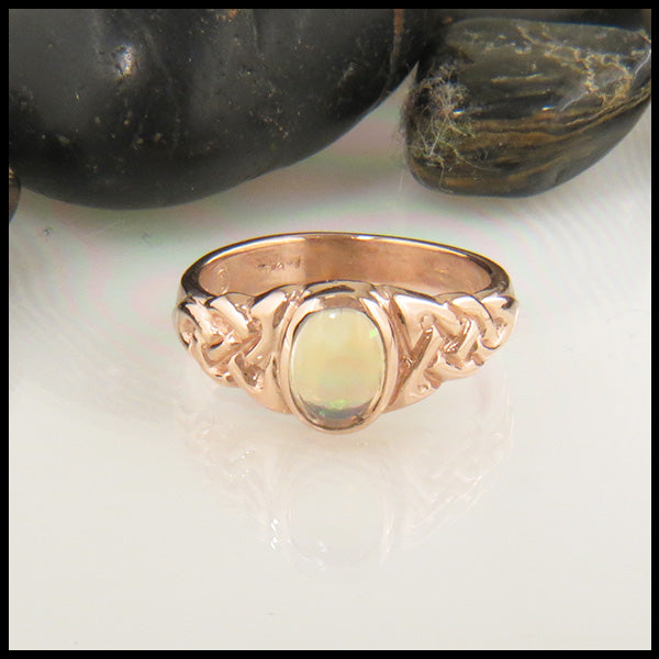 Celtic Trinity Ring with Oval Opal in Gold