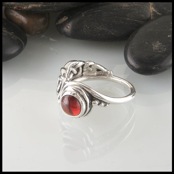 Asymmetrical Celtic Ring in Sterling Silver with Garnet