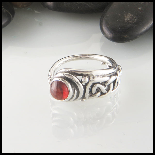 Asymmetrical Celtic Ring with Garnet