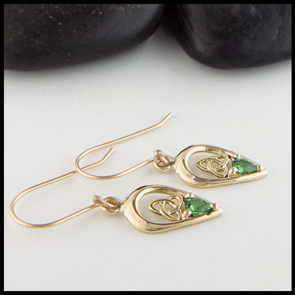 Profile view Tsavorite and Trinity Knot Drop Earrings