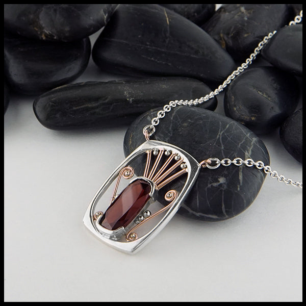 Profile view Celtic Garnet Pendant in Silver & Gold